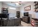 Well-lit home office with a functional desk, ample storage, and modern decor at 440 Bramble Ln, Clayton, NC 27527