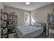 Comfortable bedroom with shelving and natural light at 460 Dickens Dr, Raleigh, NC 27610