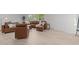 Cozy living room area with hardwood floors, ample seating, and natural light streaming through the windows at 4812 Latimer Rd, Raleigh, NC 27609