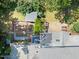 Aerial view of the property showcasing the house, gardens, landscaping, decks, and outdoor spaces at 508 N Wake St, Hillsborough, NC 27278