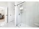 Bathroom featuring a glass shower with white subway tiles and marble floors at 508 N Wake St, Hillsborough, NC 27278