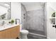 Modern bathroom with stylish vanity, sleek fixtures, and a walk-in shower featuring unique tile work at 508 N Wake St, Hillsborough, NC 27278