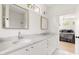 Bathroom with double sinks with marble countertops and large mirrors at 508 N Wake St, Hillsborough, NC 27278