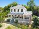 This home has a covered porch, manicured lawn, and mature landscaping at 508 N Wake St, Hillsborough, NC 27278