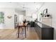Modern kitchen with a center island, stainless steel appliances, and ample counter space at 508 N Wake St, Hillsborough, NC 27278