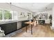 Spacious kitchen with modern appliances, ample counter space, and an adjacent dining area at 508 N Wake St, Hillsborough, NC 27278