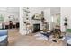 Open-concept living room featuring stylish decor and hardwood floors at 508 N Wake St, Hillsborough, NC 27278