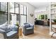 Inviting living room with comfortable seating and a view into the kitchen at 508 N Wake St, Hillsborough, NC 27278