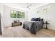 Inviting main bedroom with hardwood floors, natural light, and comfortable furnishings at 508 N Wake St, Hillsborough, NC 27278