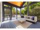 Inviting screened porch with comfortable seating, wood ceiling, and serene outdoor views at 508 N Wake St, Hillsborough, NC 27278
