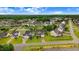 Beautiful aerial view of a neighborhood featuring well-maintained homes and lush green lawns at 52 Summit Overlook Dr, Clayton, NC 27527