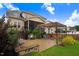 Expansive backyard with a patio, pergola, seating, and lush landscaping at 52 Summit Overlook Dr, Clayton, NC 27527