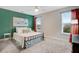 A secondary bedroom with a light-colored carpet and modern decor at 52 Summit Overlook Dr, Clayton, NC 27527
