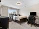 A comfortable secondary bedroom with plush carpeting and natural light at 52 Summit Overlook Dr, Clayton, NC 27527