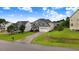 Beautiful two-story home with a well-kept lawn and a long driveway at 52 Summit Overlook Dr, Clayton, NC 27527