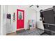 Bright sun room includes a convenient door and is outfitted with an exercise machine at 5309 Meadow Field Dr, Mebane, NC 27302
