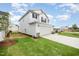Charming two-story home featuring a two-car garage, well-maintained lawn, and driveway at 58 W Emily Gardens Dr, Selma, NC 27576