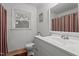 This cozy bathroom features a single sink vanity, and a window letting in natural light at 625 Powell Dr, Rocky Mount, NC 27803