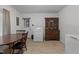 This cozy dining area combines dining space and laundry room with natural light at 625 Powell Dr, Rocky Mount, NC 27803