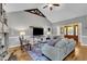 Inviting living room with vaulted ceilings, wood beam accents, and a view into the foyer at 71 Smithsanders Ct, Smithfield, NC 27577