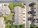An aerial view captures townhomes with landscaped lawns and a well-maintained neighborhood at 8004 Thrush Ridge Ln, Raleigh, NC 27615