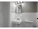 Clean bathroom with white tile and updated fixtures at 813 Burton St, Rocky Mount, NC 27803