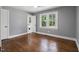 Cozy bedroom with hardwood floors and natural light at 813 Burton St, Rocky Mount, NC 27803