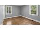 Bright bedroom with two windows at 813 Burton St, Rocky Mount, NC 27803