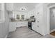Well-lit kitchen with updated appliances and neutral finishes at 813 Burton St, Rocky Mount, NC 27803