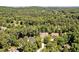 Aerial view highlighting this homes position among wooded lots at 84307 Winslow, Chapel Hill, NC 27517