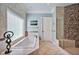 Luxurious bathroom with a soaking tub, walk-in shower, and decorative tiles, creating a spa-like retreat at 84307 Winslow, Chapel Hill, NC 27517