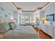 Serene bedroom with tray ceiling, natural light, and plush bedding for a comfortable and stylish retreat at 84307 Winslow, Chapel Hill, NC 27517