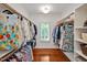 Spacious walk-in closet with custom shelving and hardwood floors at 84307 Winslow, Chapel Hill, NC 27517