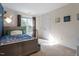 Charming bedroom with a storage bed, large window and neutral carpeting at 9504 Anson Grove Lane Ln, Raleigh, NC 27615