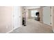 Large bedroom featuring a work area, neutral carpet, and two closets at 9504 Anson Grove Lane Ln, Raleigh, NC 27615