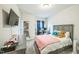 This bedroom features a bed, a TV, and a dresser at 1051 Jura Ridge Dr, Fuquay Varina, NC 27526