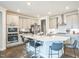 Bright kitchen with a large island, stainless steel appliances, and ample cabinet space at 1051 Jura Ridge Dr, Fuquay Varina, NC 27526