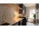 Well-organized laundry room featuring ample counter space, modern appliances, and ample storage at 1113 Mordecai Dr, Raleigh, NC 27604