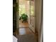 Bright living room featuring hardwood floors, large windows, and stylish decor at 1113 Mordecai Dr, Raleigh, NC 27604