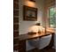 Cozy office space featuring a wooden desk, stylish lighting, and a comfortable chair at 1113 Mordecai Dr, Raleigh, NC 27604