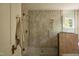 Contemporary shower showcasing neutral tiling, glass enclosure, and upscale fixtures at 1113 Mordecai Dr, Raleigh, NC 27604
