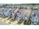 Aerial view of a neighborhood showcasing home exteriors, driveways, landscaping and street parking at 1208 Brown Velvet Ln, Apex, NC 27523