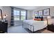 Bedroom with king bed, soccer-themed decor, and natural light at 121 Seagraves Creek Ln, Holly Springs, NC 27540