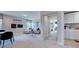 Entertainmant room features a game table, kitchenette, and bedroom access at 121 Seagraves Creek Ln, Holly Springs, NC 27540