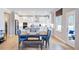 Elegant kitchen and dining area with stainless steel appliances and an open layout at 121 Seagraves Creek Ln, Holly Springs, NC 27540