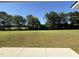 Large, private backyard with mature trees at 128 Oakfield Trace Dr, Four Oaks, NC 27524
