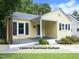 Quaint yellow bungalow featuring a covered front porch, just 4 mins to Downtown Durham at 1410 Shawnee St, Durham, NC 27701