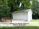 Detached garage or shed, great for storage or a workshop with a deck at 1410 Shawnee St, Durham, NC 27701