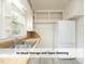 Kitchen featuring plenty of storage, open shelving and a modern refrigerator at 1410 Shawnee St, Durham, NC 27701