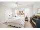 Comfortable bedroom featuring neutral colors, a wicker headboard, and double closets at 1414 Park Dr, Raleigh, NC 27605